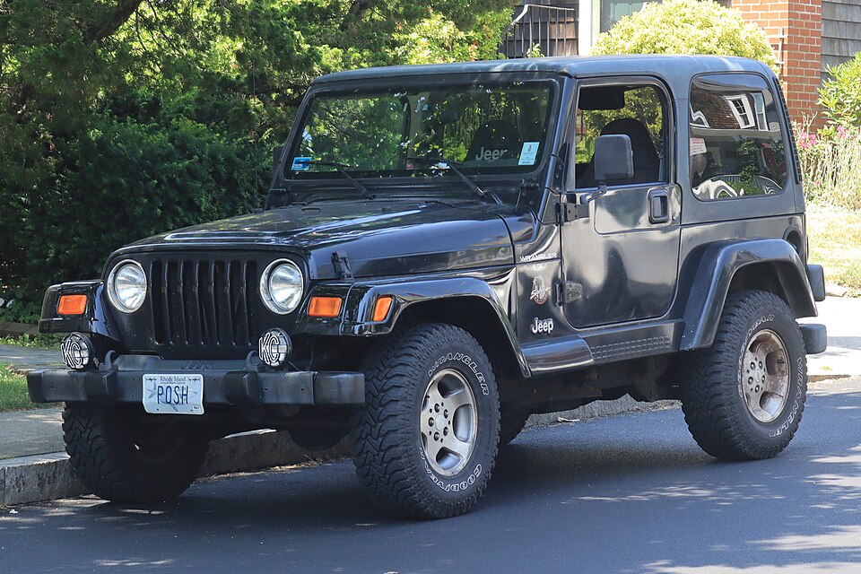 2001 Jeep Wrangler Sahara in Black, front left, 07-04-2026