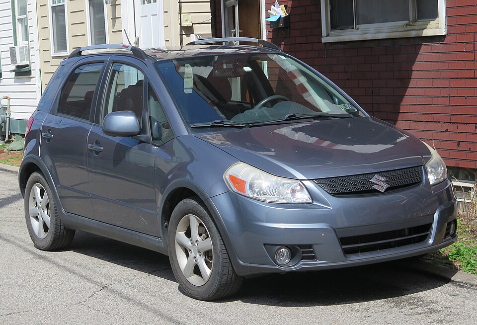 2009 Suzuki SX4 crossover in Quicksilver Metallic, front right, 04-04-2026