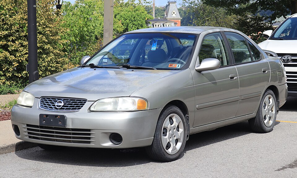 2003 Nissan Sentra GXE in Radium Gray, front left, 08-23-2026