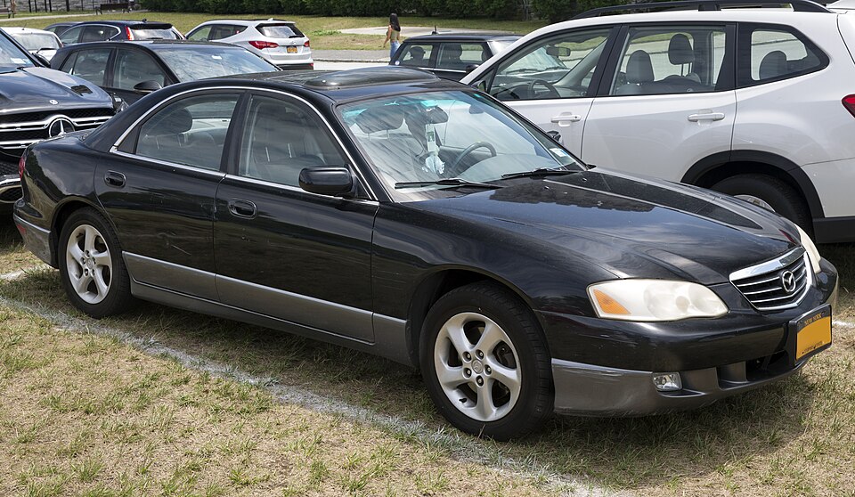 2002 Mazda Millenia in Black, front right (Sands Point)