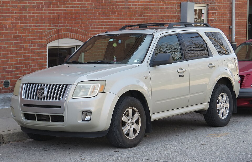 2009 Mercury Mariner in Brilliant Silver Metallic, front left, 03-15-2026