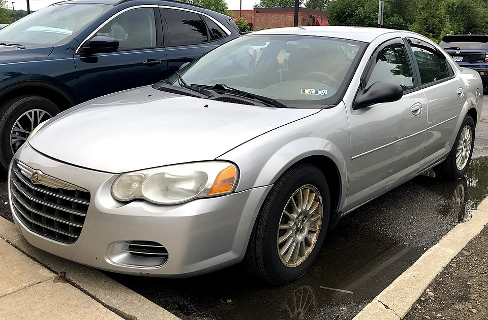 2005 Chrysler Sebring in Brilliant Silver Metallic, front left, 5-29-2021
