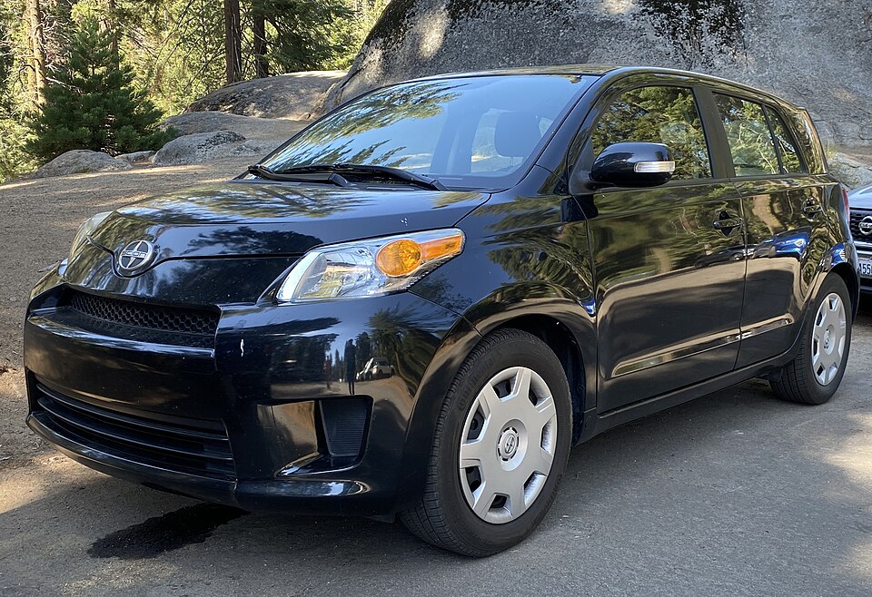 2013 Scion xD in Black Pearl Metallic, front left, 08-10-2022
