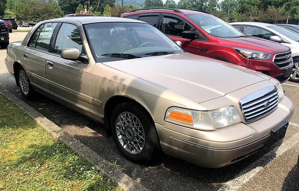 1998 Ford Crown Victoria LX in Harvest Gold Metallic, front left, 7-5-2021