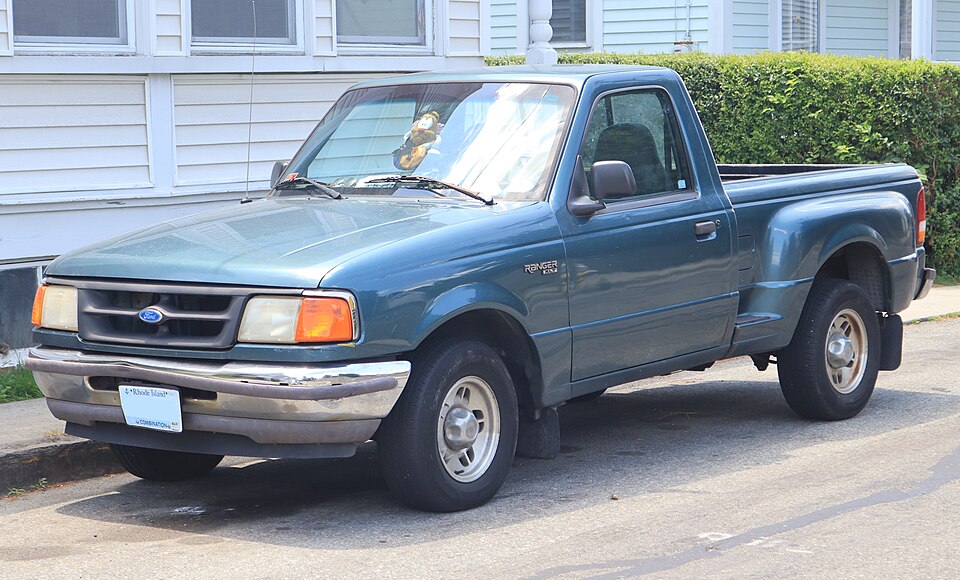 1997 Ford Ranger XLT Flareside in Cayman Green Metallic, front left, 07-04-2026