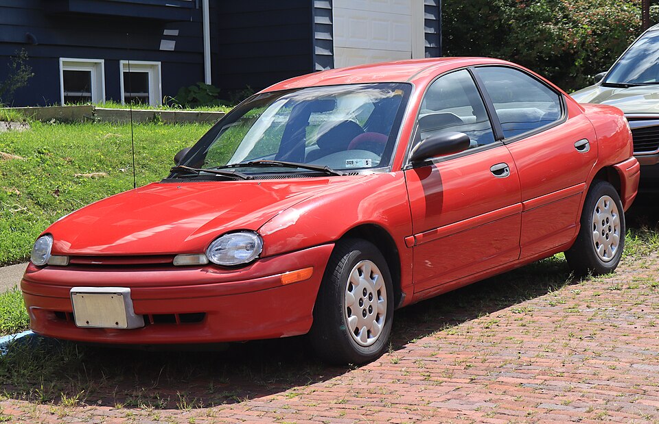 1997 Dodge Neon Sport in Flame Red, front left, 08-23-2026