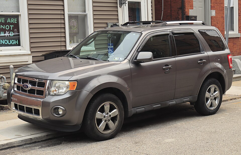2011 Ford Escape Limited in Sterling Grey Metallic, front left, 07-17-2026