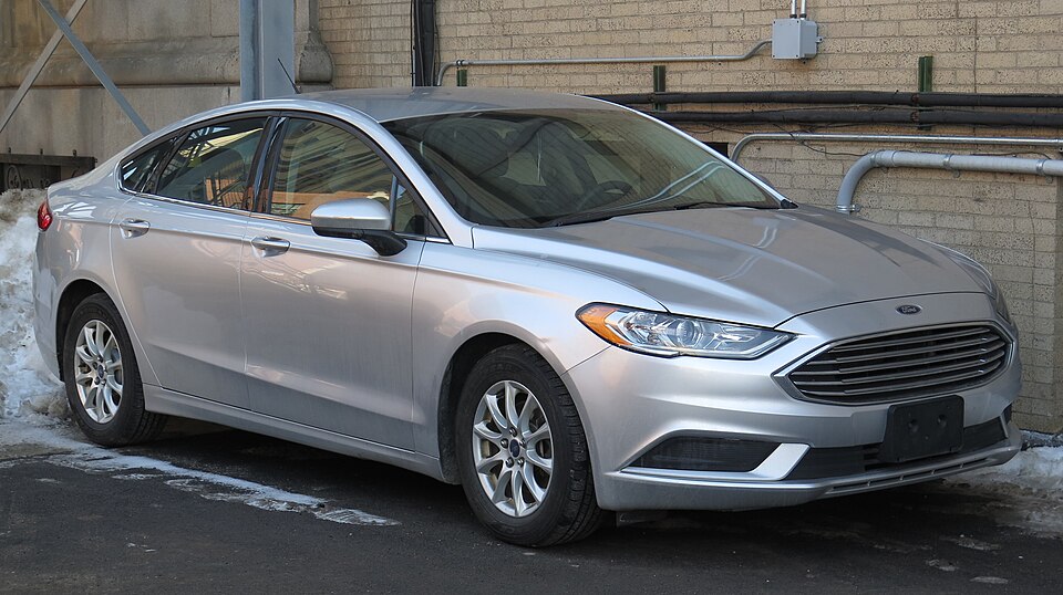 2017 Ford Fusion in Ingot Silver, front right, 02-14-2026