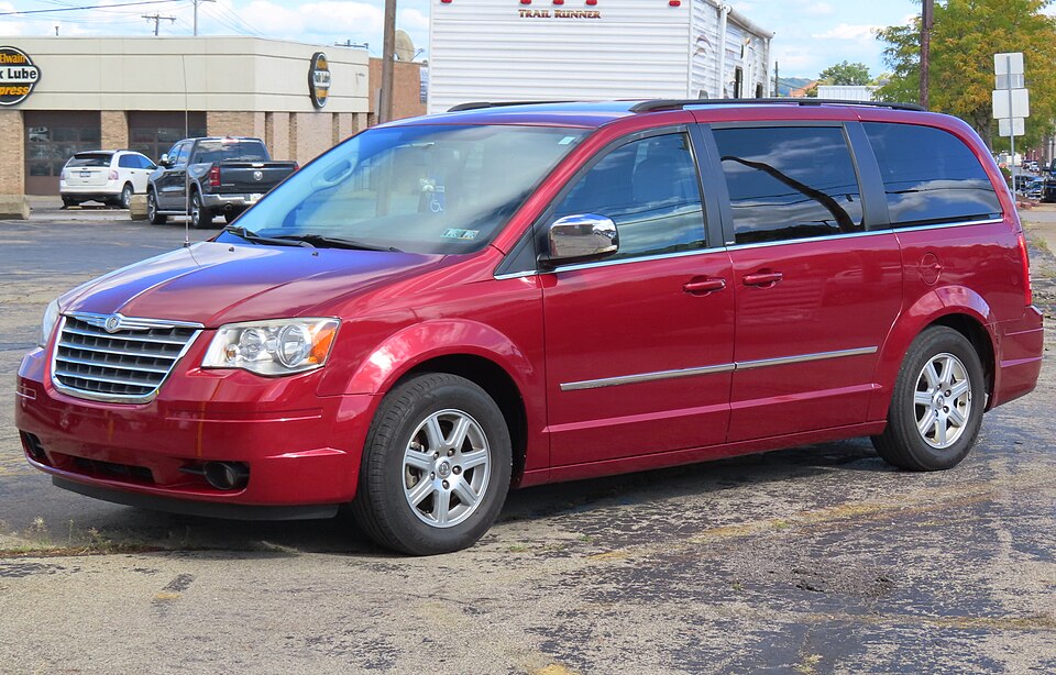 2010 Chrysler Town & Country Touring Plus, front left, 09-30-2023