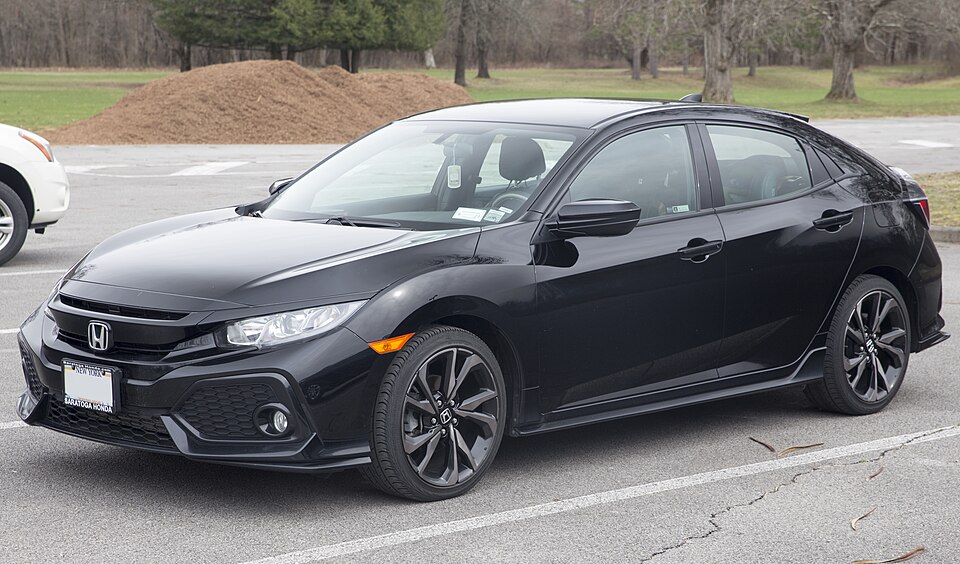2018 Honda Civic Sport Hatchback in Crystal Black, front left