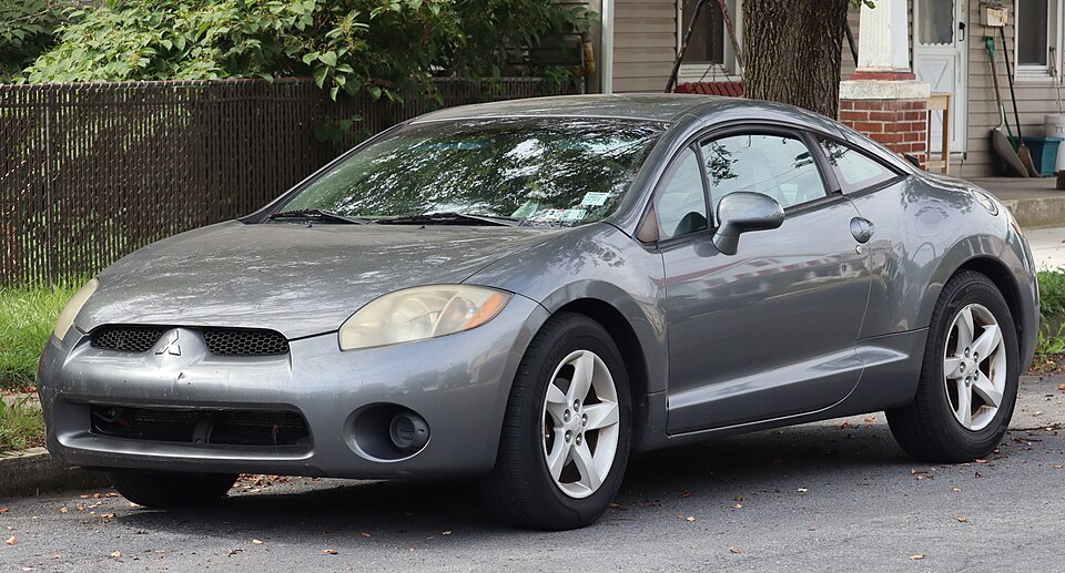 2006 Mitsubishi Eclipse GS in Titanium Gray Pearl, front left, 09-19-2026