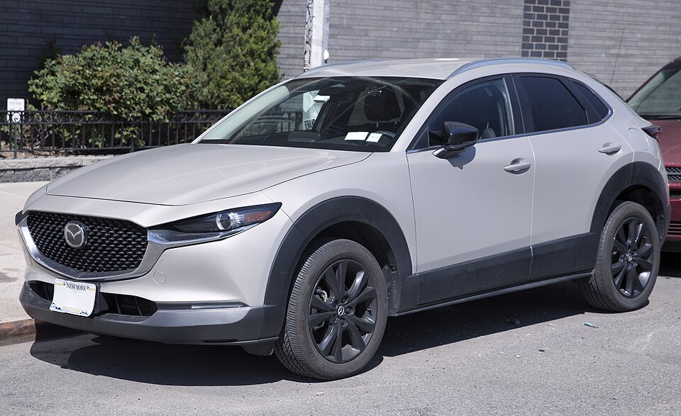 2024 Mazda CX-30 Select in Platinum Quartz, front left
