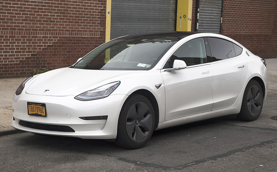 2020 Tesla Model 3 on taxi plates, Long Island City (front left)