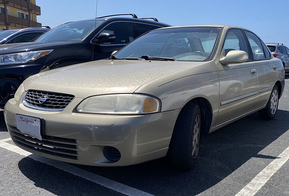 2000 Nissan Sentra GXE in Iced Cappuccino Metallic, front left, 08-14-2022