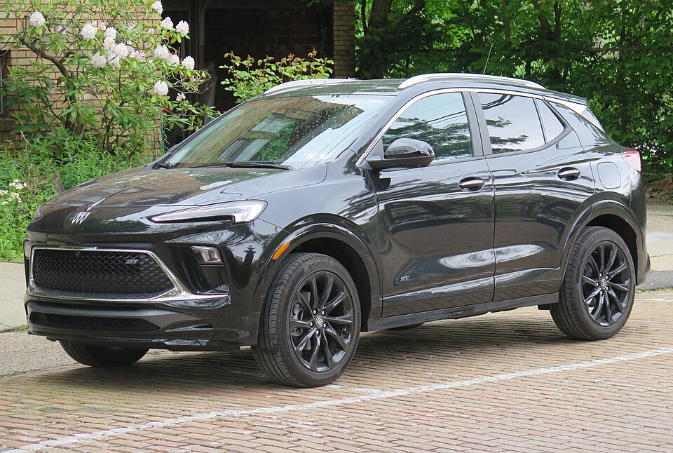 2026 Buick Encore GX Sport Touring in Ebony Twilight Metallic, front left, 05-16-2026