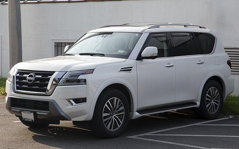 2023 Nissan Armada SL in Aspen White TriCoat, front left