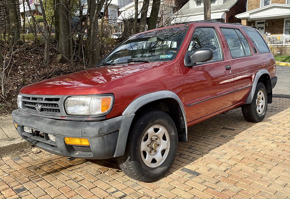 1996 Nissan Pathfinder XE in Cayenne Red, front left, 3-24-2022