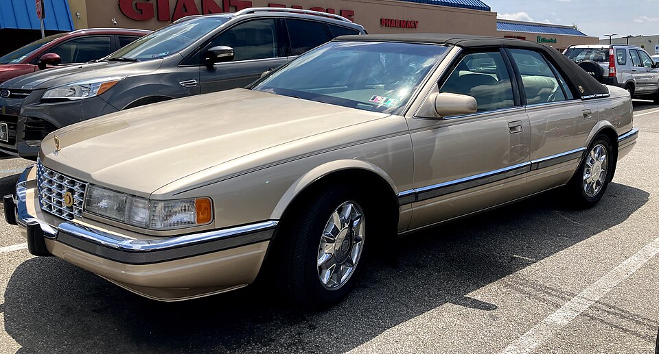 1997 Cadillac Seville SLS in Sand Metallic, front right, 6-26-2021