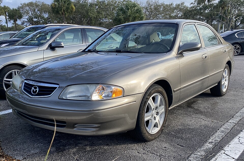 2002 Mazda 626 ES V6 in Driftwood Mica, front left, 01-17-2024