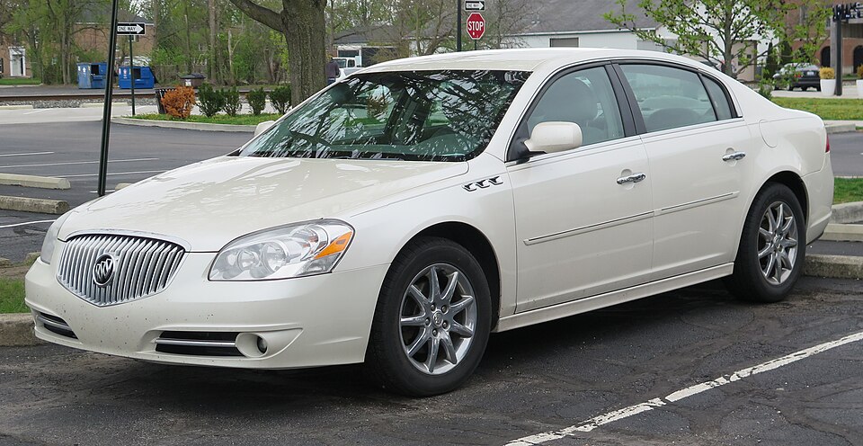 2010 Buick Lucerne CX in White Diamond Tricoat, front left, 04-26-2025