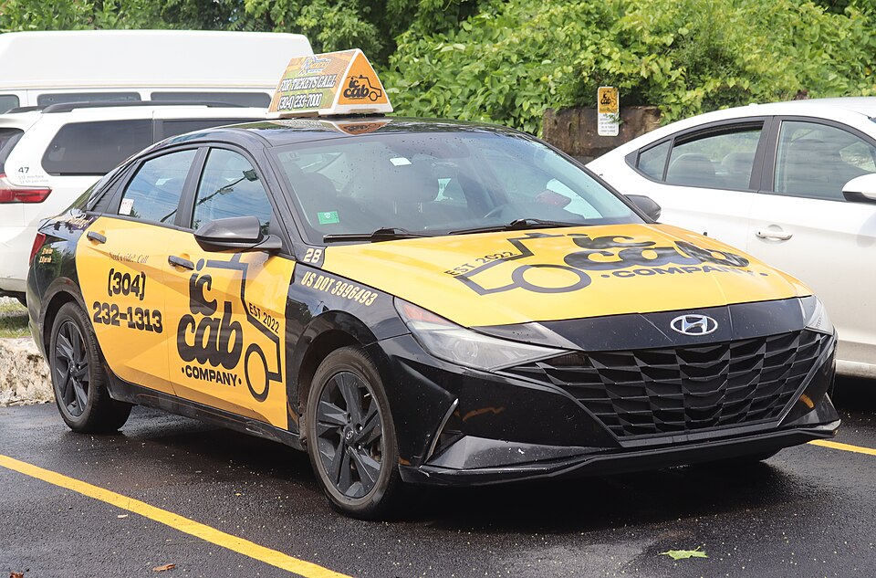 2023 Hyundai Elantra Hybrid Blue taxicab, front right, 06-06-2026