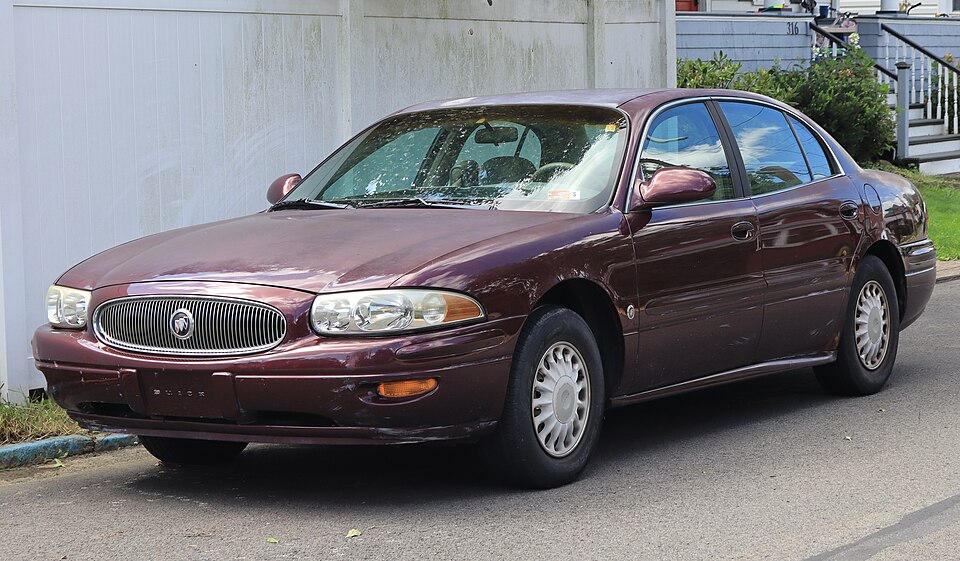 2003 Buick LeSabre Custom in Cabernet Red Metallic, front left, 08-23-2026