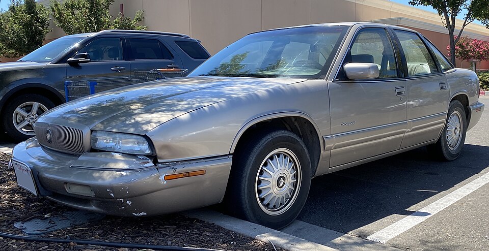 1996 Buick Regal Custom in Light Driftwood Metallic, front left, 08-07-2022