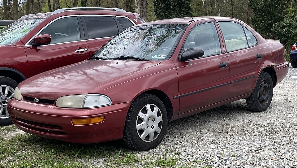 1996 Geo Prizm LSi in Crimson Cloak Pearl, front left, 04-23-2024