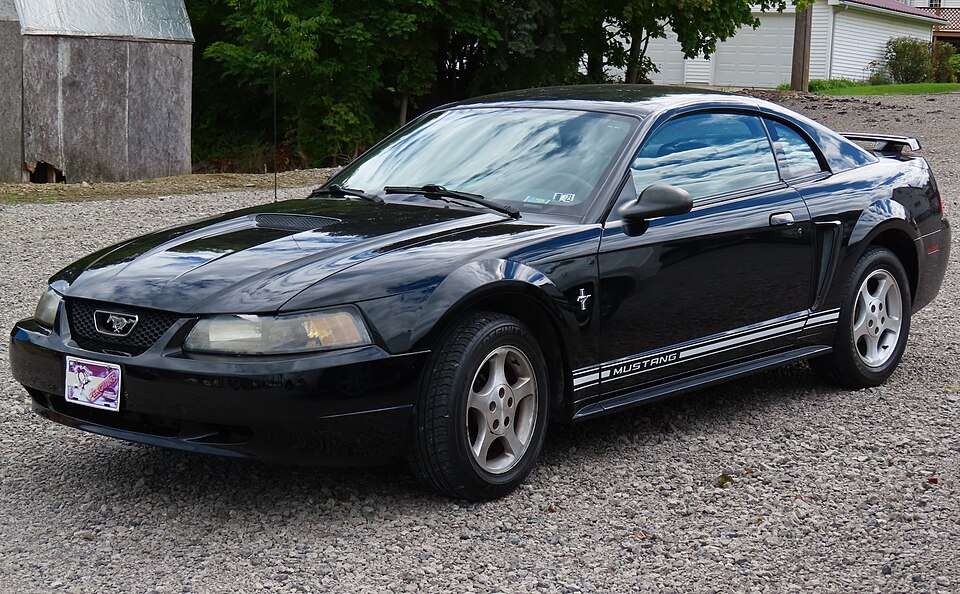 2001 Ford Mustang Coupe with Premium Equipment Group, front left (2022 Ellwood City Fall Fest & Car Cruise)