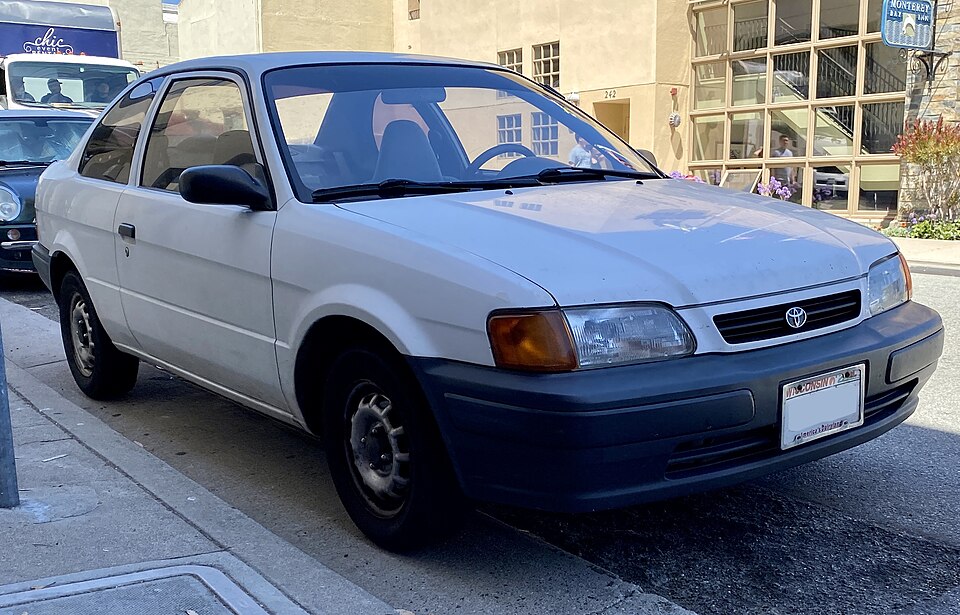 1996 Toyota Tercel 2dr STD in Super White, front right, 08-13-2022