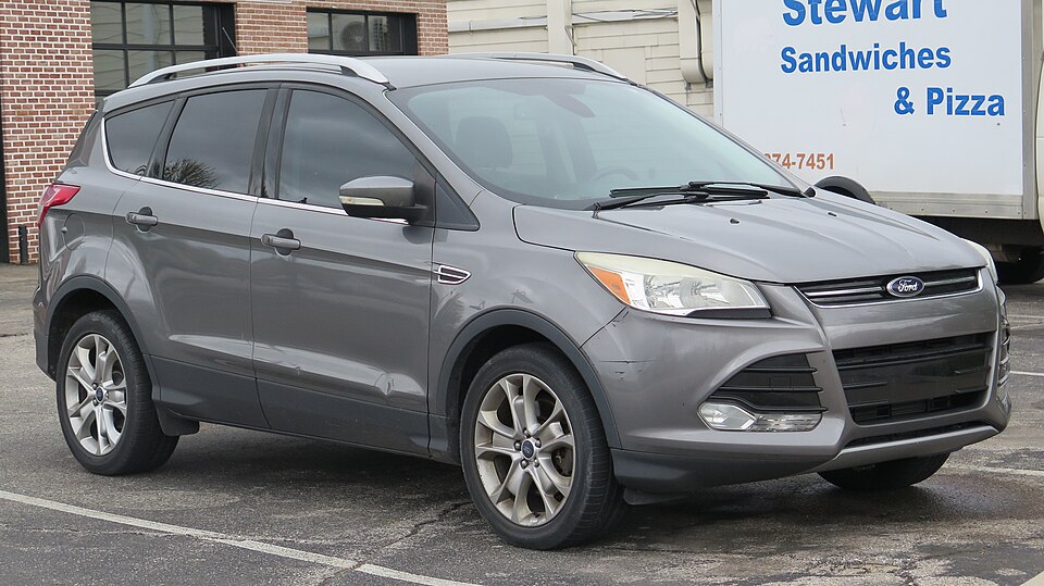 2014 Ford Escape Titanium in Sterling Gray Metallic, front right, 04-26-2025