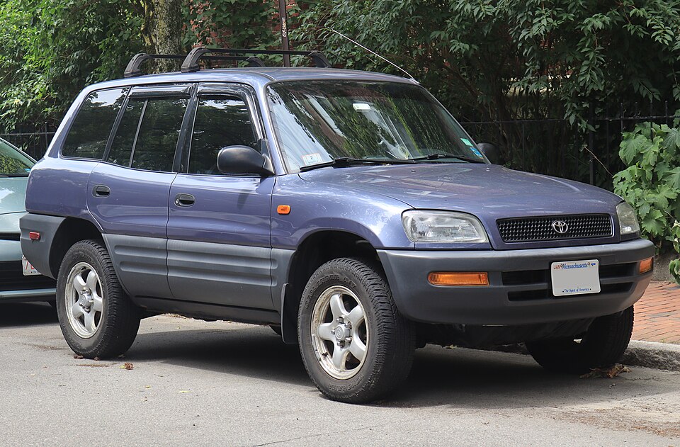 1996 Toyota RAV4 in Purple Storm Metallic, front right, 07-06-2026