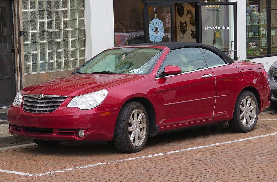2008 Chrysler Sebring Limited Convertible in Inferno Red Crystal Pearlcoat, front left, 05-16-2026