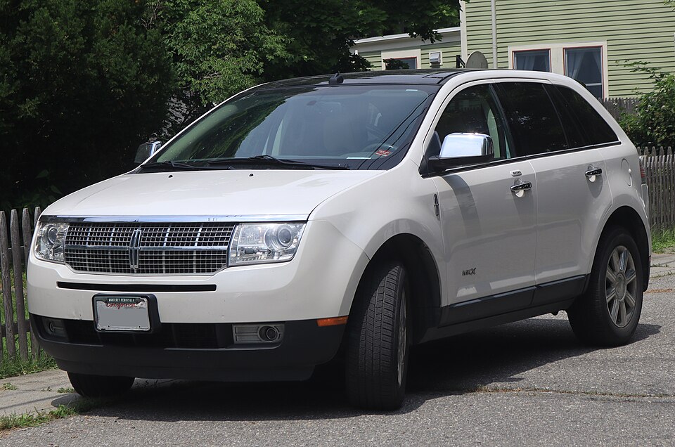 2009 Lincoln MKX in White Platinum Tri-Coat, front left, 07-07-2026