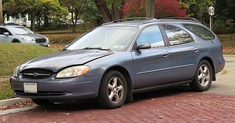 2000 Ford Taurus wagon in Graphite Blue Metallic, front left, 10-11-2025