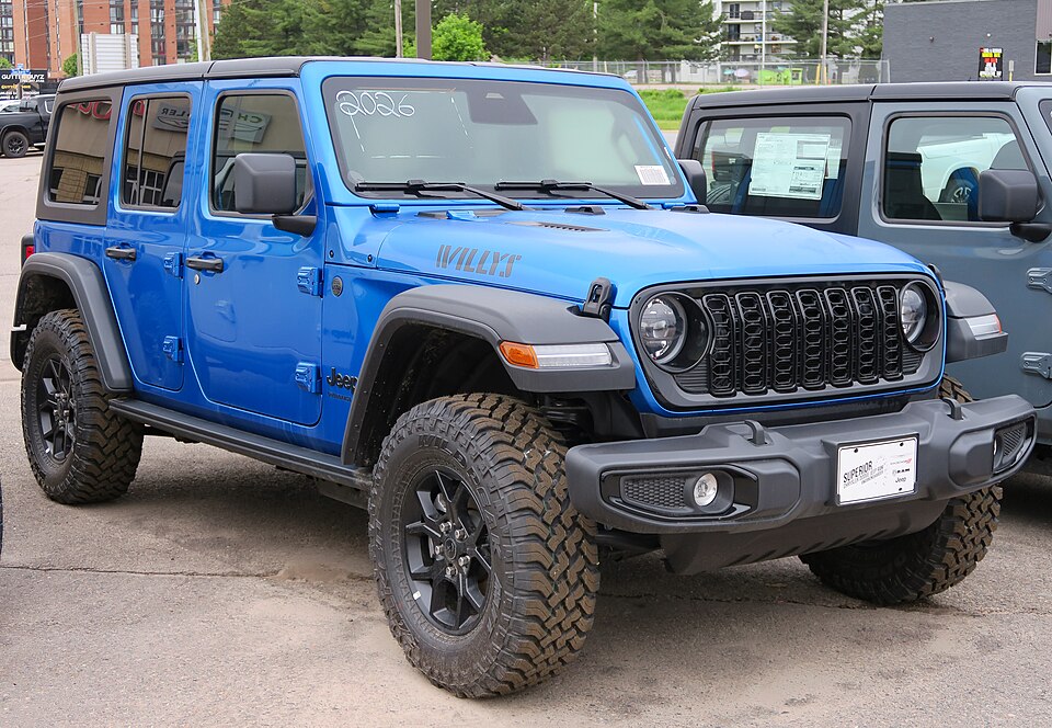 2026 Jeep Wrangler 4-Door Willys in Hydro Blue Pearl, front right, 2026-06-14