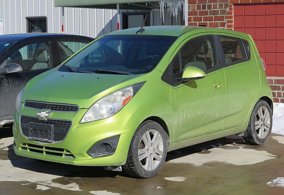 2013 Chevrolet Spark in Jalapeno, front left, 02-08-2026