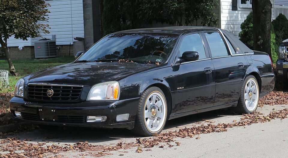 2001 Cadillac DeVille DTS in Sable Black, front left, 09-20-2025
