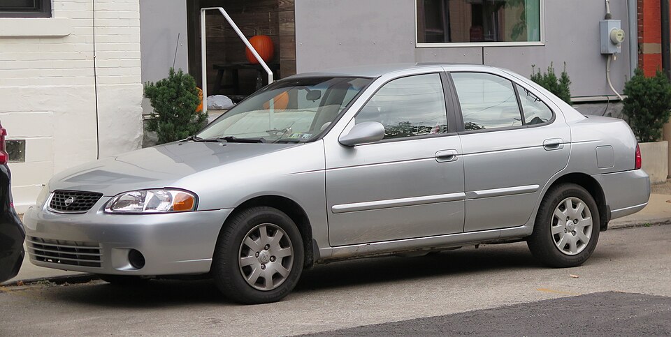 2002 Nissan Sentra GXE in Molten Silver, front left, 10-25-2025