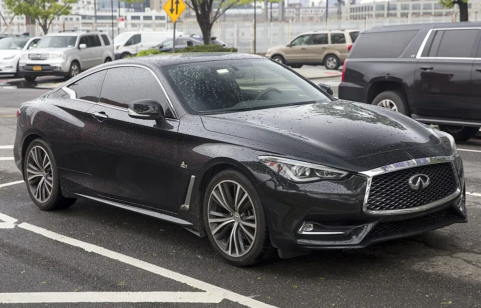 2018 Infiniti Q60 3.0t Sport AWD (Black Obsidian), front right, photographed in United States