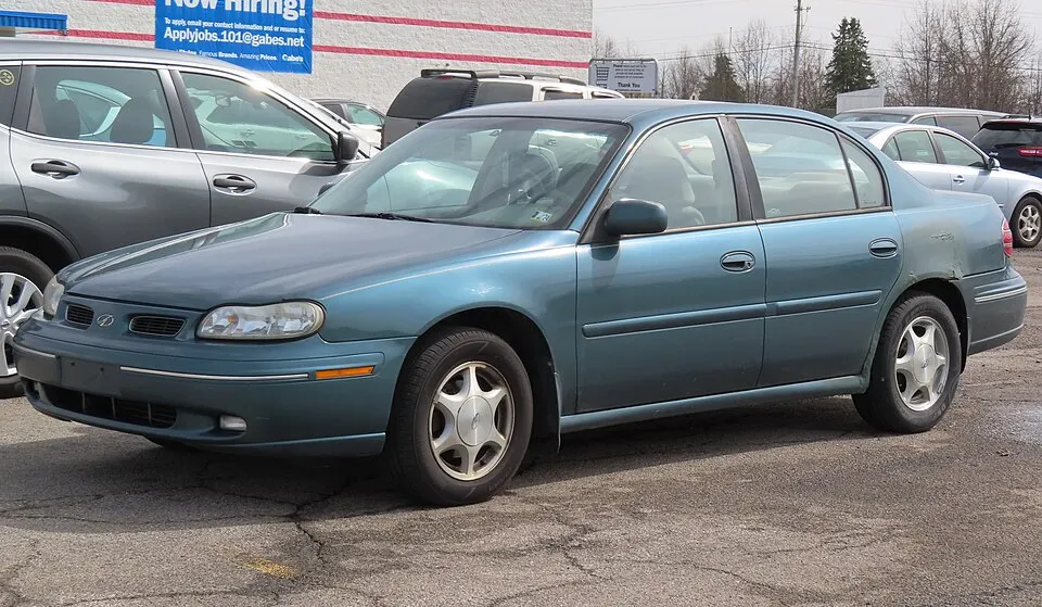 1998 Oldsmobile Cutlass GL, front left, 03-08-2024, photographed in United States