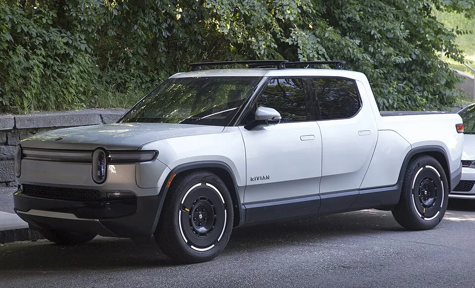 2025 Rivian R1T Adventure in LA Silver with the Road Trip Package, front left, photographed in United States