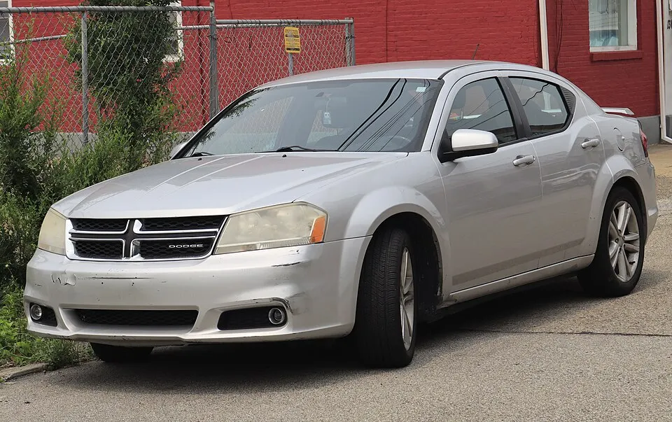 2012 Dodge Avenger SXT Plus in Bright Silver Metallic, front left, 07-17-2026, photographed in United States
