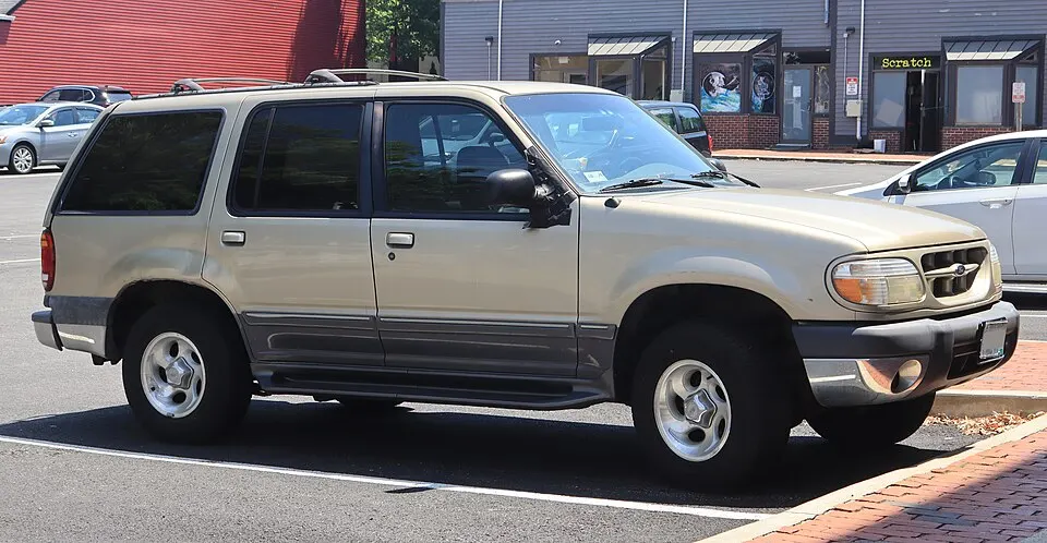 2000 Ford Explorer XLT in Harvest Gold Metallic, front right, 07-04-2026, photographed in United States