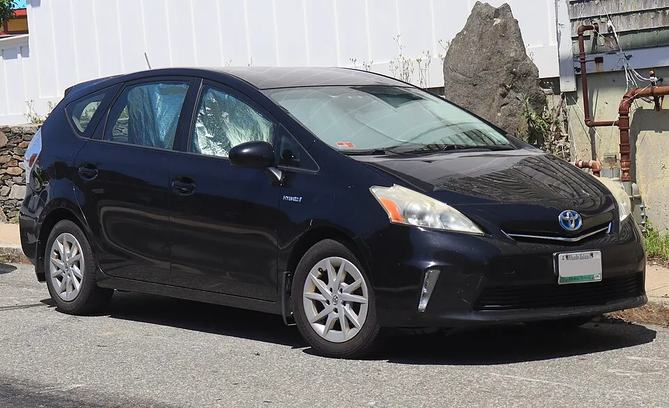 2013 Toyota Prius V in Black, front right, 07-04-2026, photographed in United States