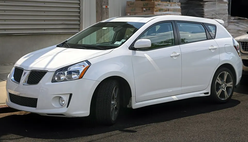 2010 Pontiac Vibe GT in white, left front, photographed in United States