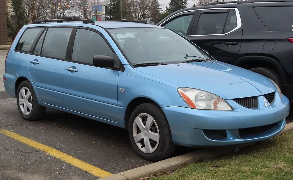 2004 Mitsubishi Lancer Sportback LS, front right, 02-06-2023, photographed in United States
