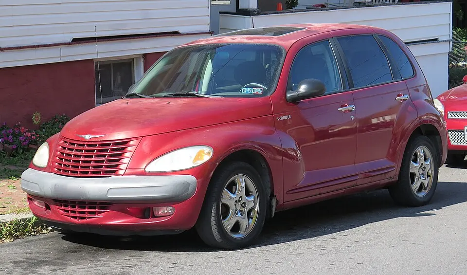 2001 Chrysler PT Cruiser in Inferno Red, front left, 09-20-2025, photographed in United States