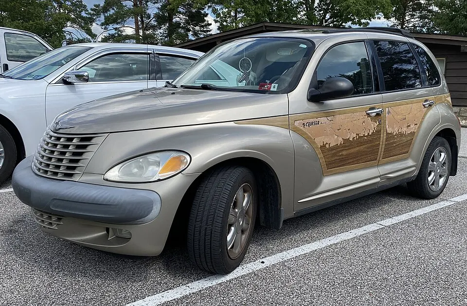 2002 Chrysler PT Cruiser Dream Cruiser Woody in Light Almond Pearl Metallic Clearcoat, front left, 08-20-2022, photographed in United States