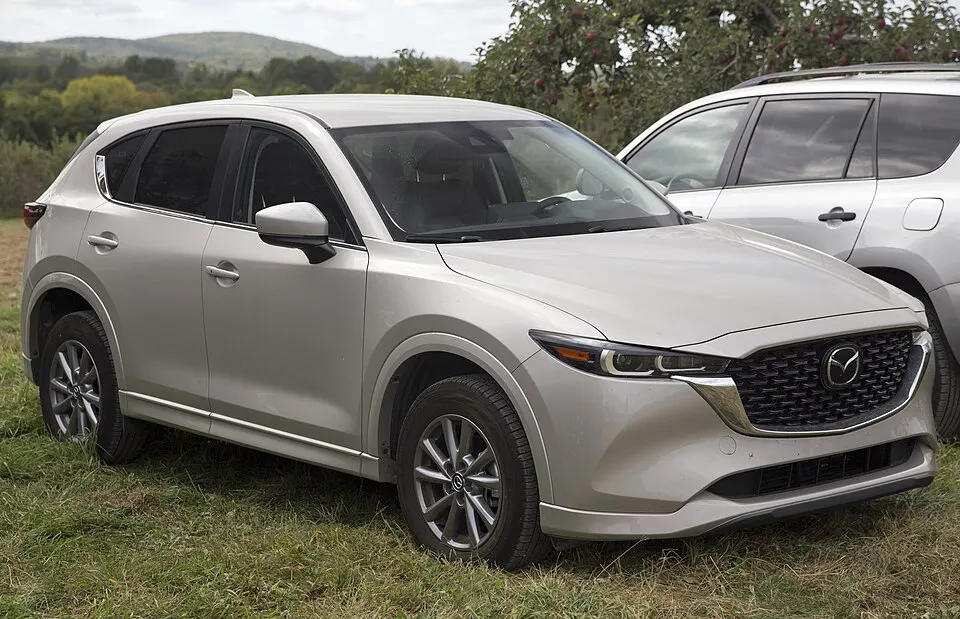 2024 Mazda CX-5 2.5 S Select in Platinum Quartz Metallic, front right, photographed in United States
